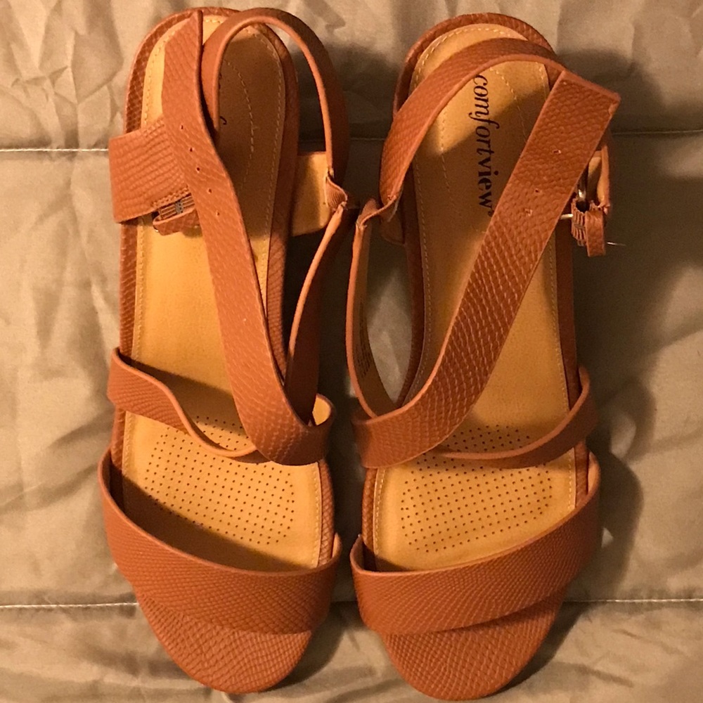 Brown, snake-like, strappy, open-toed wedge!